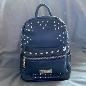 Bebe (Los Angeles) black mini backpack with studs and rhinestones.